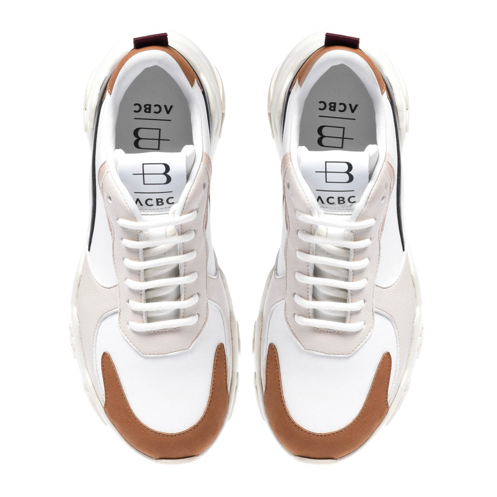 
                  
                    Trainer in tobacco and cream eco-leather
                  
                