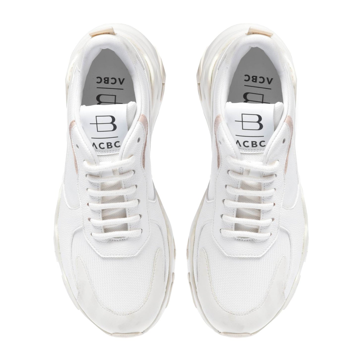 
                  
                    Trainers in cream eco-leather
                  
                
