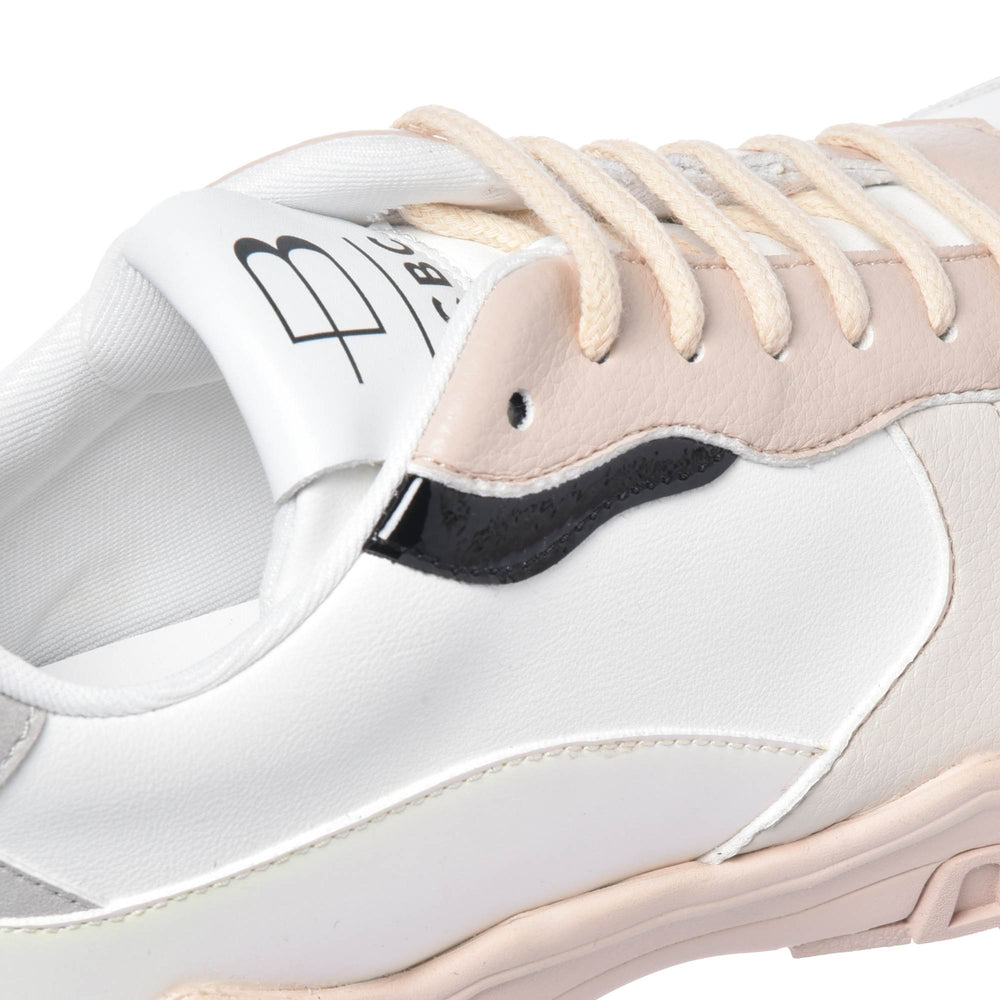 
                  
                    Trainer in grey and cream eco-leather
                  
                