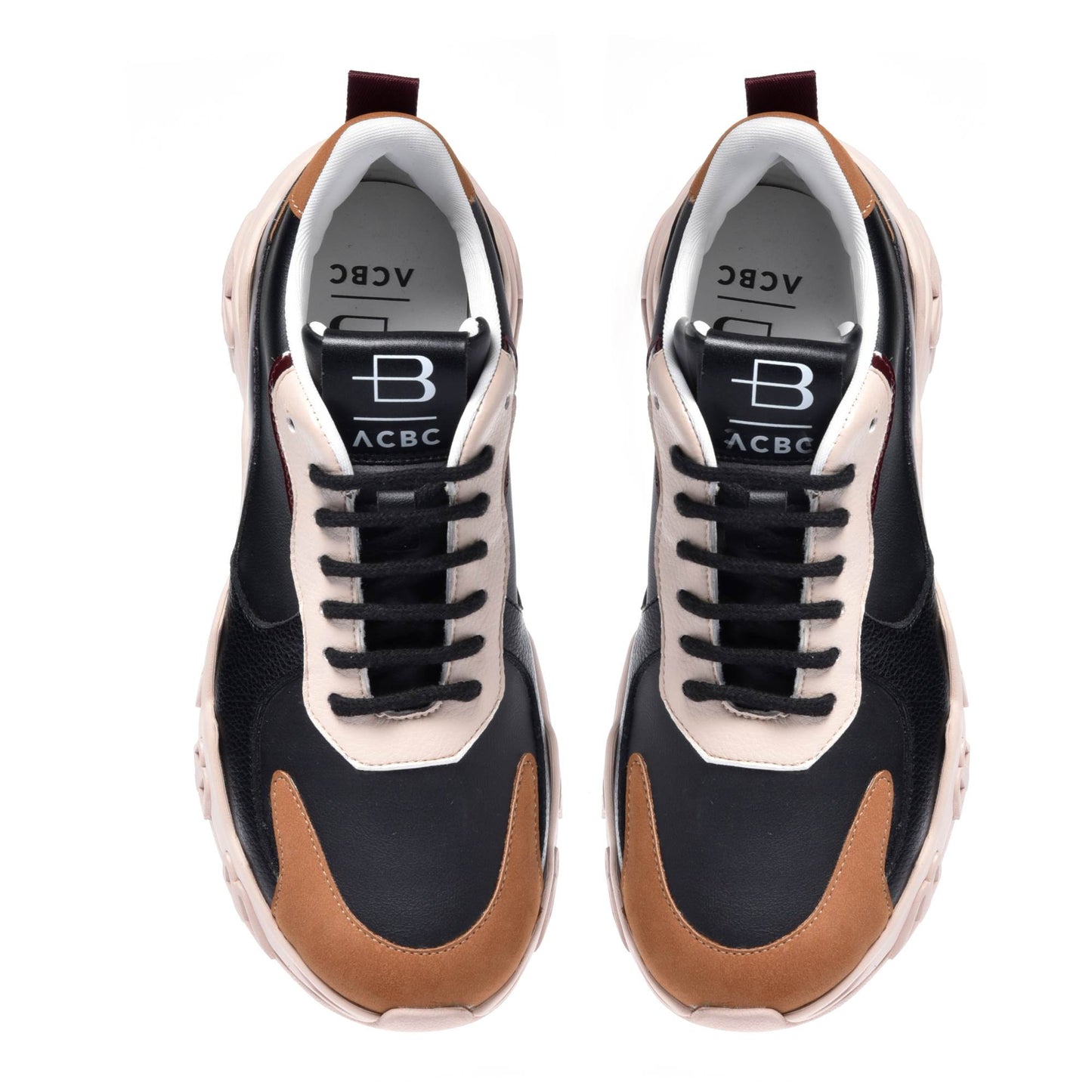 
                  
                    Tobacco and black eco-leather trainer
                  
                