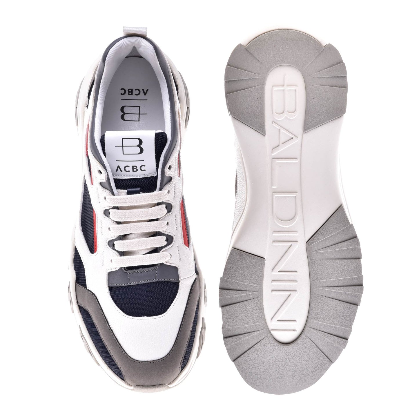 
                  
                    Trainers in white and dark grey eco-leather
                  
                