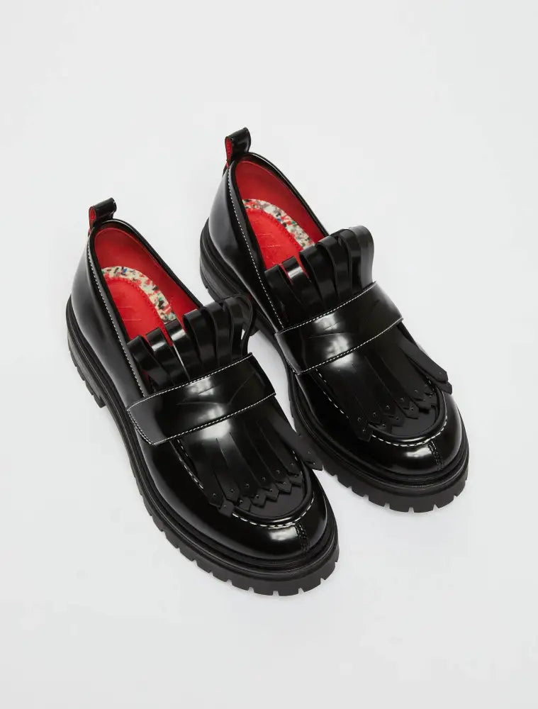 
                  
                    Maxi-Fringed Loafers - Black Shoes
                  
                